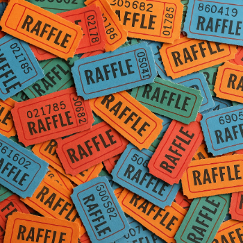 A pile of raffle tickets seperated and scattered.