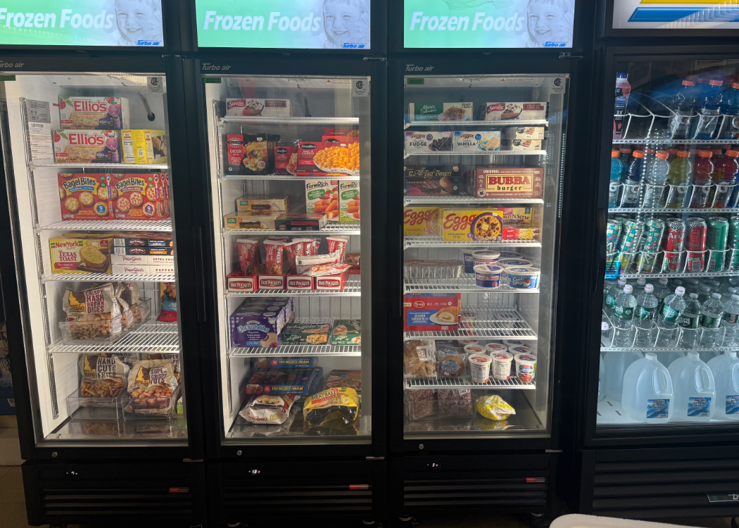 Coolers with frozen items and drinks.