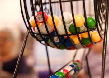 A cage with bingo balls.